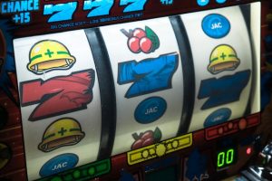 Slot machine almost got 3 7s